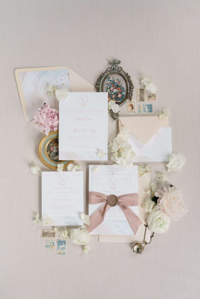 full suite view with light pink, silk ribbon, ocean and personalized crest